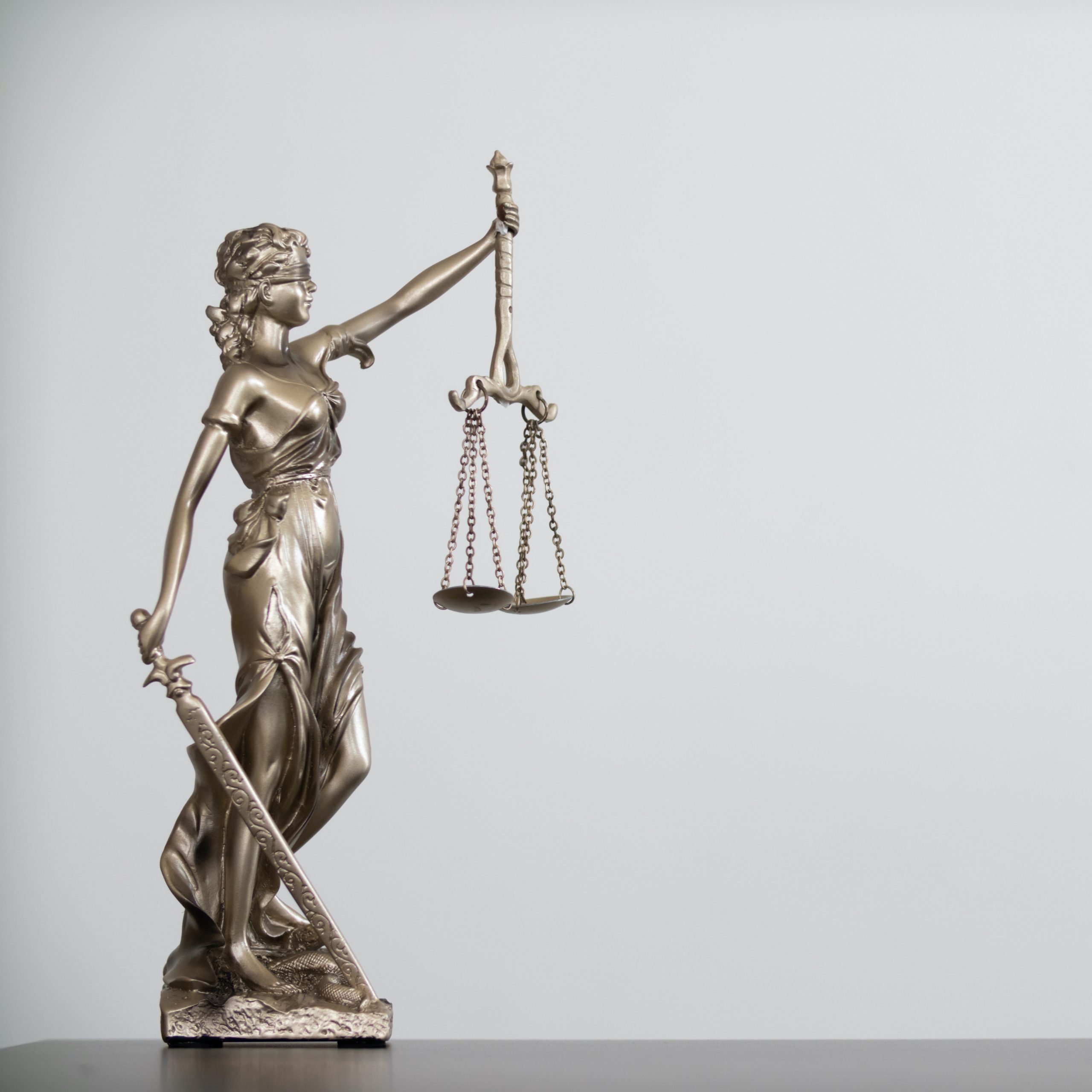 statue of god Themis Lady Justice is used as symbol of justice within law firm to demonstrate truthfulness of  facts and power to judge without prejudice. Themis Lady Justice is of justice.